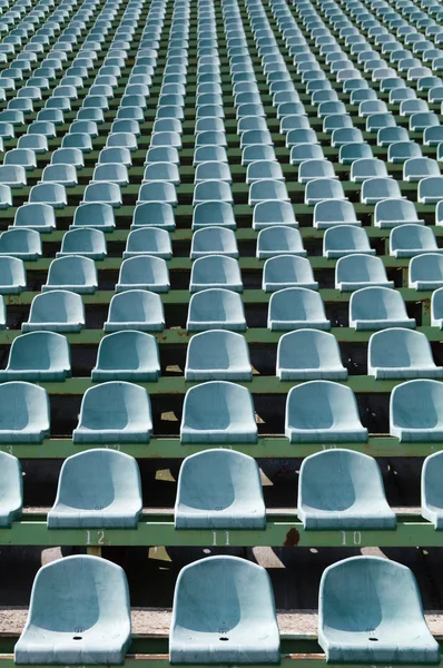 Green seats for spectators in the stadium — Stock Photo, Image