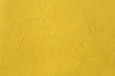 Sarı dokulu duvar. arka plan