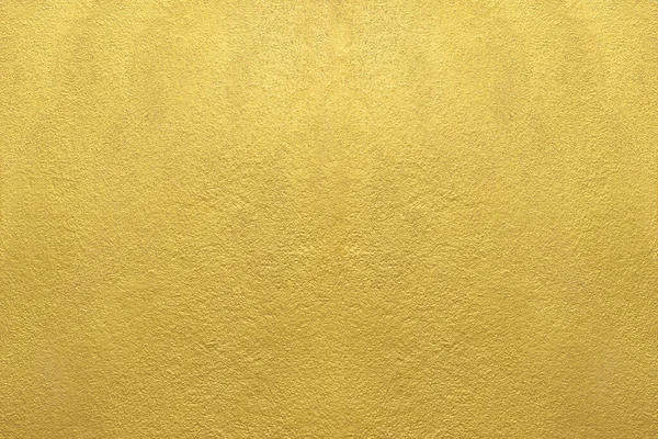 金の壁の質感の背景 コンクリート壁の表面に黄色の光沢のある金の塗料 鮮やかな黄金の豪華な壁紙 水平線 — ストック写真