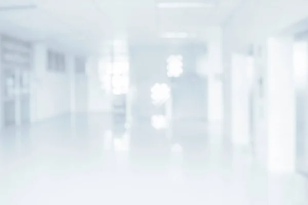 hospital blur bokeh white background. Empty corridor in modern hallway office hospital abstract blurred backgroun