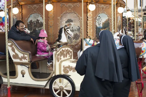 Nuns look carousel — Stock Photo, Image