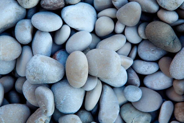 Fondo de guijarros de roca blanca pulida naturalmente — Foto de Stock