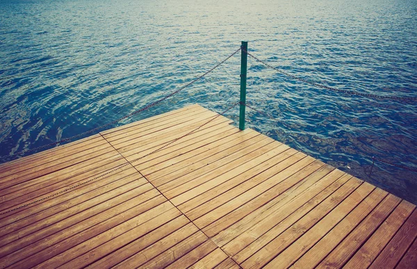 Muelle de madera y agua — Foto de Stock