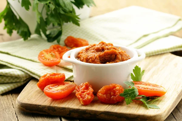 Red pesto sun-dried tomatoes in a white bowl — Stock Photo, Image