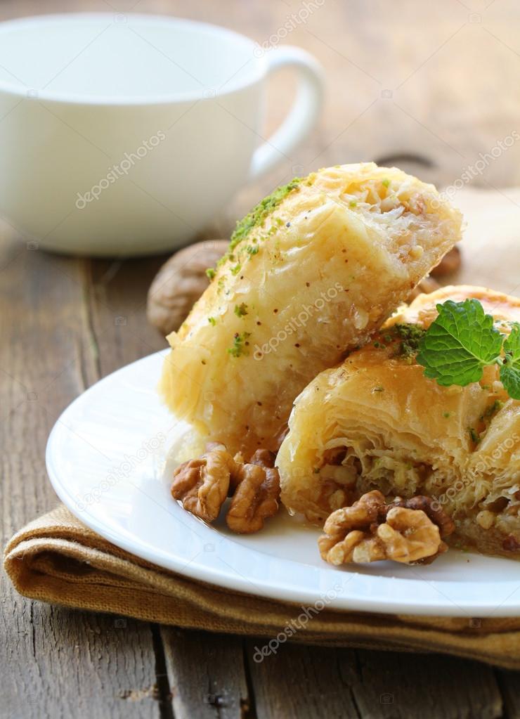 Traditional Turkish arabic dessert - baklava with honey and nuts