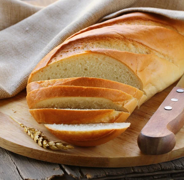 Fresh white loaf of bread , rustic style — Stock Photo, Image