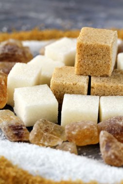 Different types of sugar - brown, white and refined sugar clipart