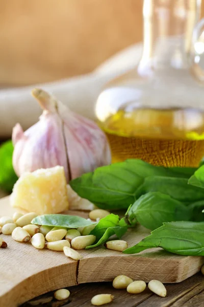 Ingredients for pesto, basil, olive oil, pine nuts, garlic and parmesan — Stock Photo, Image