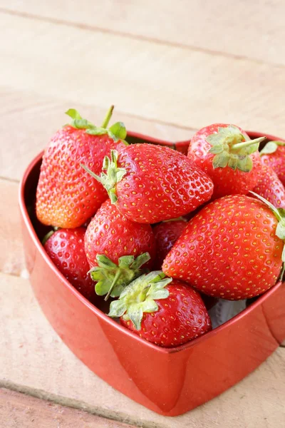 Fresh strawberries in a heart shaped box — Stock Photo, Image