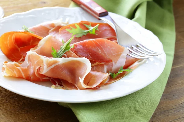 Delicious sliced ham on plate — Stock Photo, Image
