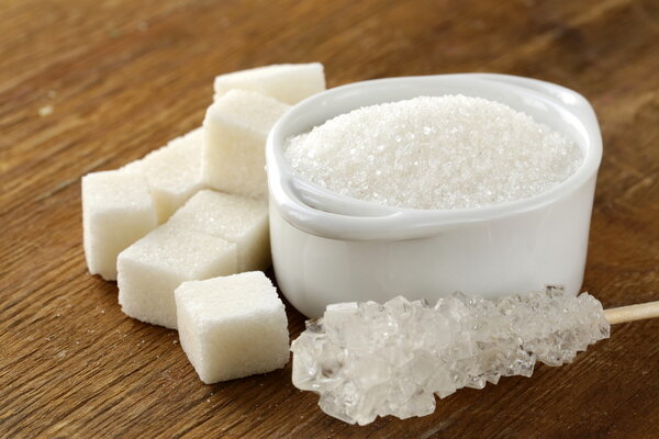 Several types of white sugar - refined sugar and granulated sugar