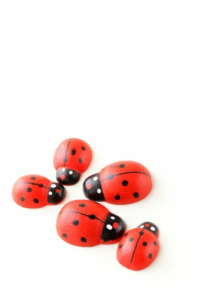 Wooden ladybugs symbol of spring — Stock Photo, Image