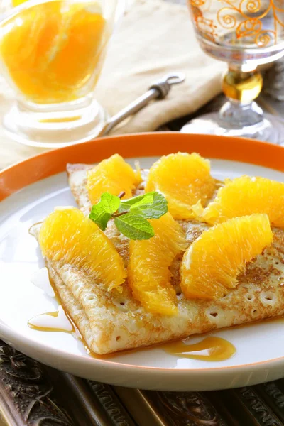 "crêpes suzette" pancakes with orange and sweet sauce — Zdjęcie stockowe