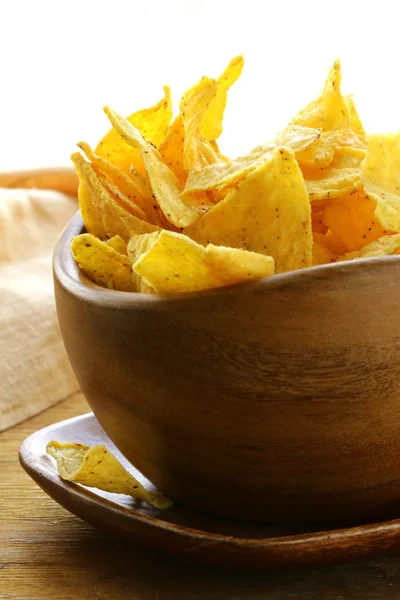 Corn tortilla chips in a wooden bowl — Stock Photo, Image