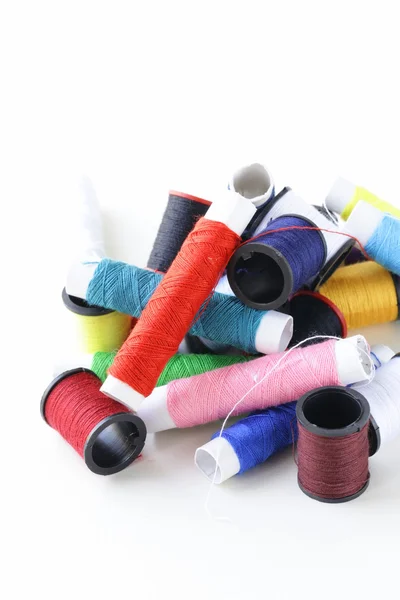 ミシン用品 - コイル有色の糸 ストック画像