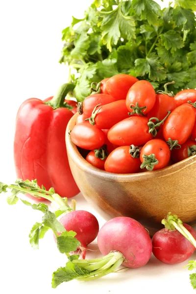 Cherry tomatoes, radishes, peppers and parsley - assorted vegetables — Stock Photo, Image