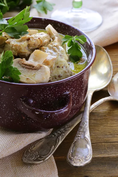 Stew chicken in a creamy sauce with mushrooms — Stock Photo, Image