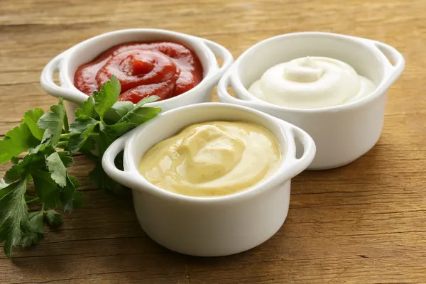 Mustard, ketchup and mayonnaise - three kinds of sauces — Stock Photo, Image