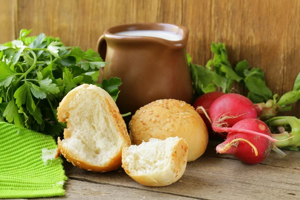 Various vegetables and herbs, bread and milk - rustic still life — Stock Photo, Image