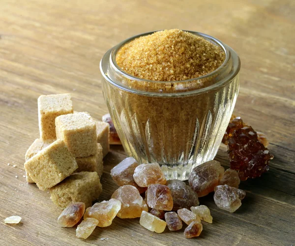 Assorted brown sugar - sand, crystal and refined — Stock Photo, Image