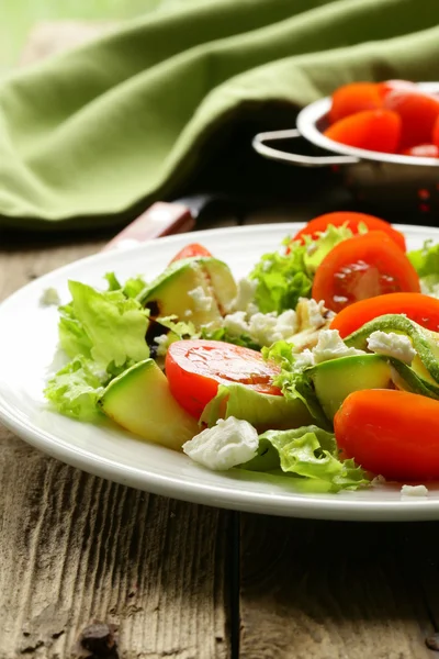 Salad zucchini with tomatoes and soft cheese — Stock Photo, Image