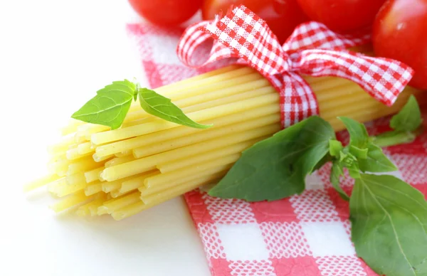 Italian still life - pasta, tomato and basil, healthy food — Stock Photo, Image