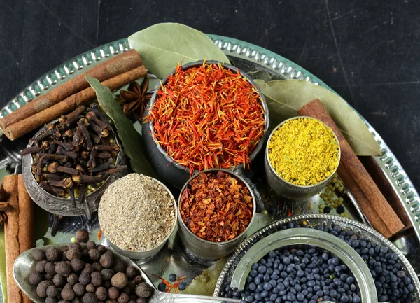 Collection of various spices (paprika, turmeric, pepper, aniseed, cinnamon, saffron) — Stock Photo, Image