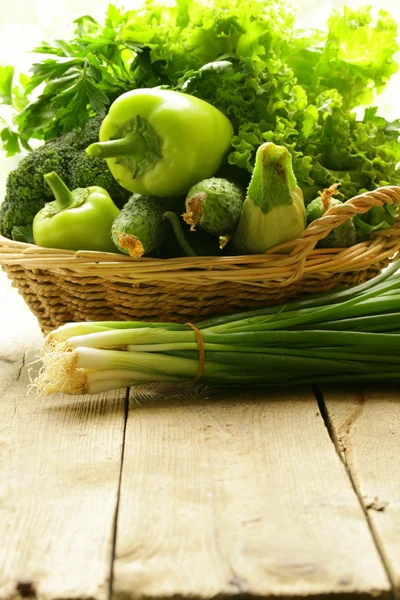 Various green vegetables (peppers, broccoli, cucumbers, green onions, lettuce) — Stock Photo, Image