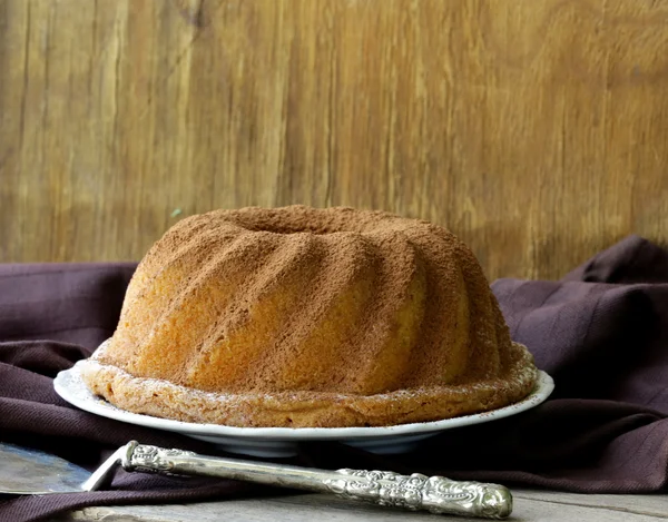 Festive round biscuit cake on wooden table — Stock Photo, Image