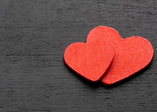 Two red wooden hearts - symbol of love — Stock Photo, Image