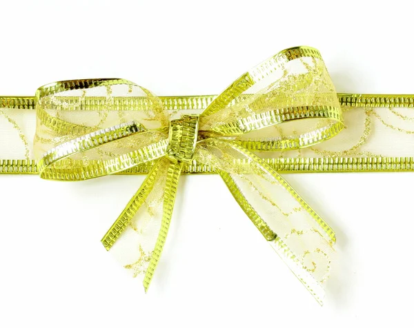 Golden holiday ribbon bow on white background — Stock Photo, Image