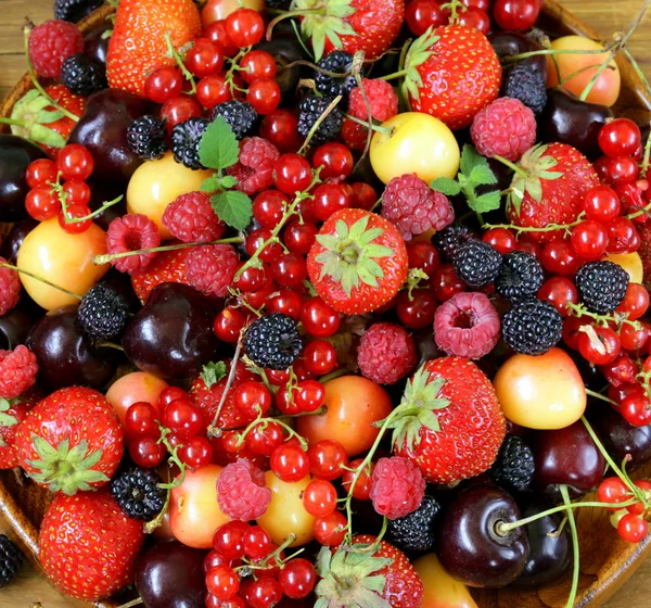 Berry background is fresh and ripe fruit — Stock Photo, Image