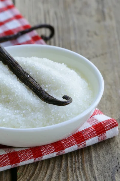 Sugar with natural vanilla pods in a cup — Stock Photo, Image