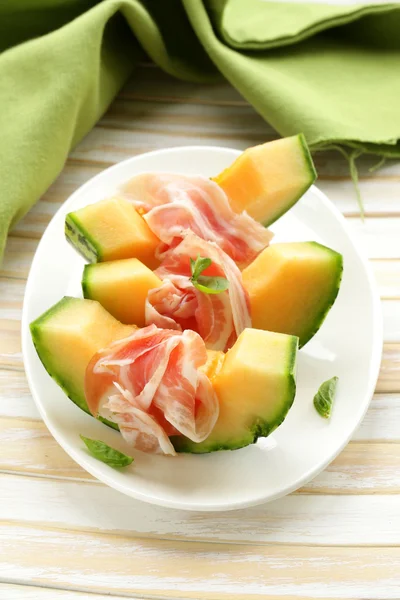 Italian antipasti melon with smoked ham (prosciutto melone) — Stock Photo, Image