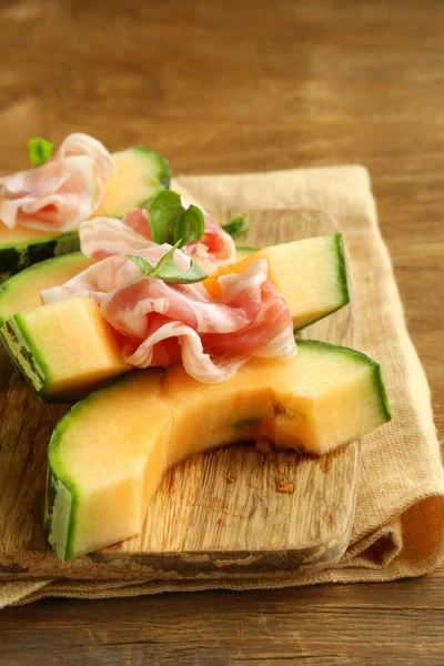 Italian antipasti melon with smoked ham (prosciutto melone) — Stock Photo, Image