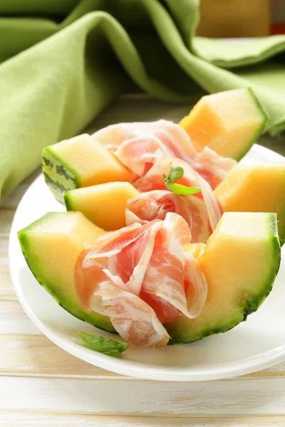 Italian antipasti melon with smoked ham (prosciutto melone) — Stock Photo, Image