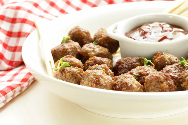 Meatballs - traditional meat dish with sauce and herbs — Stock Photo, Image