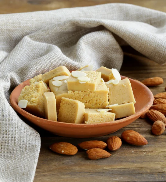 Almond paste - marzipan in a bowl with whole nuts — Stock Photo, Image