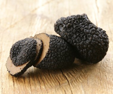 Delicacy mushroom black truffle - rare and expensive vegetable clipart