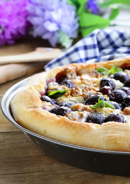 Homemade pie (galette) with grapes and blue cheese — Stock Photo, Image