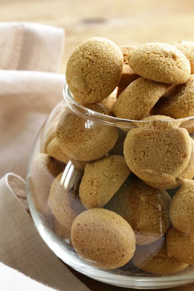 Italian almond amaretti cookies in a glass bowl — Stock Photo, Image