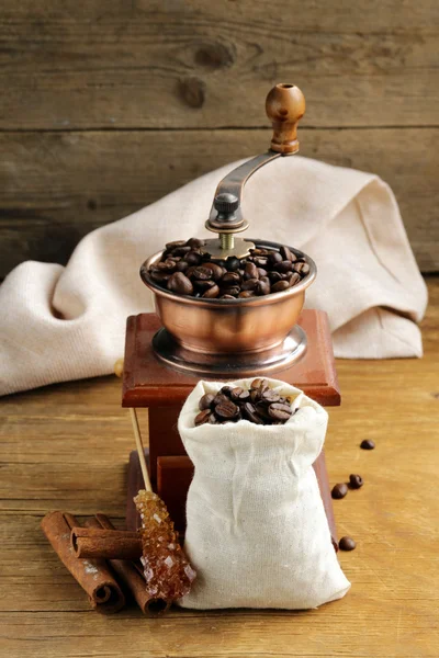 Roasted coffee beans on a wooden table — Stock Photo, Image