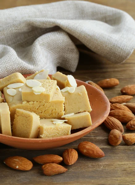 Almond paste - marzipan in a bowl with whole nuts — Stock Photo, Image