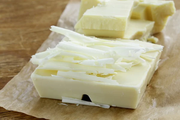 Large bar white chocolate pieces and chips — Stock Photo, Image
