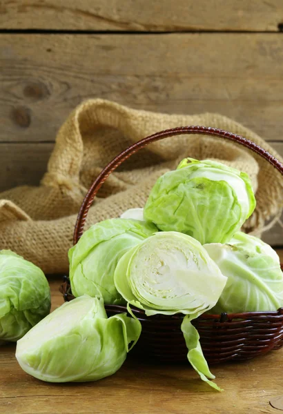 Ripe white cabbage on a wooden table — Stock Photo, Image