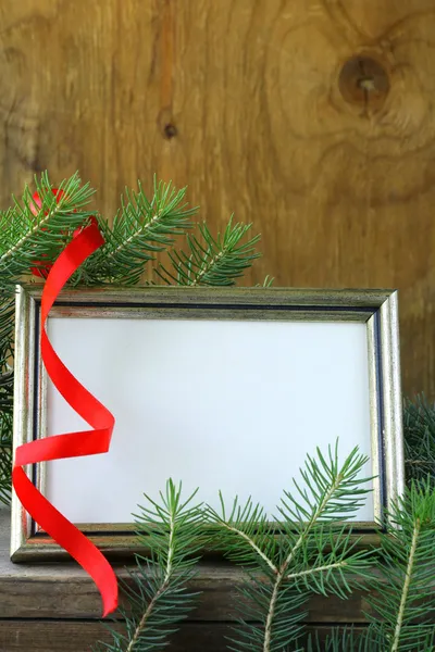 Empty frame with Christmas decorations and fir branches — Stock Photo, Image