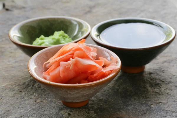 Traditional Japanese condiments - wasabi, ginger and soy sauce — Stock Photo, Image