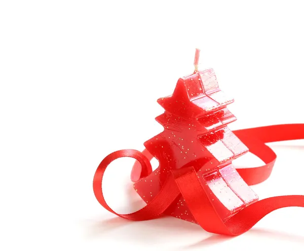 Červená vánoční svíčka v podobě vánoční stromeček — Stock fotografie
