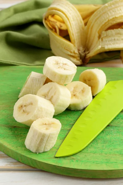 Fresh ripe banana peeled and sliced — Stock Photo, Image