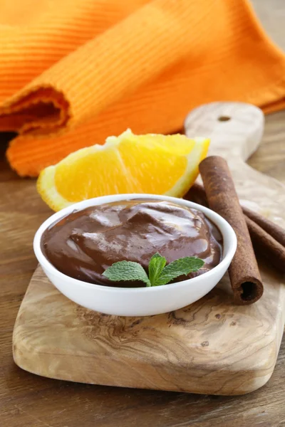 Dessert of chocolate mousse (melted chocolate) with orange — Stock Photo, Image